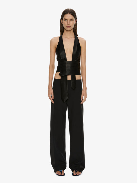 Image of a model wearing Pants. Product name - Tuxedo Contrast Wool Trouser in Black colour by brand - CHRISTOPHER ESBER