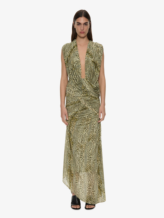 Image of a model wearing Skirts. Product name - Orion Midi Skirt in Citrine colour by brand - CHRISTOPHER ESBER