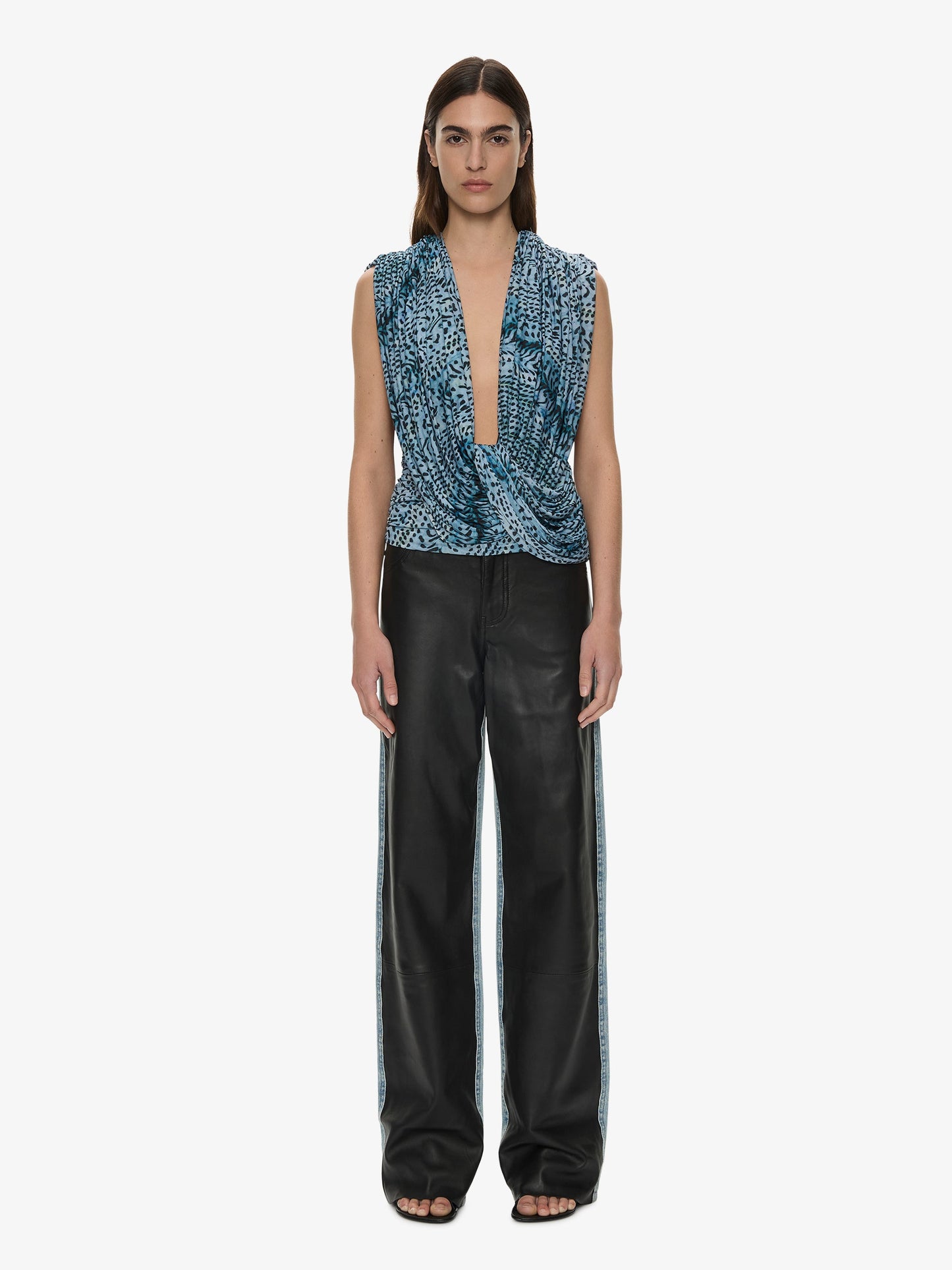 Image of a model wearing Tops. Product name - Ripple Drape Top in Petrol colour by brand - CHRISTOPHER ESBER