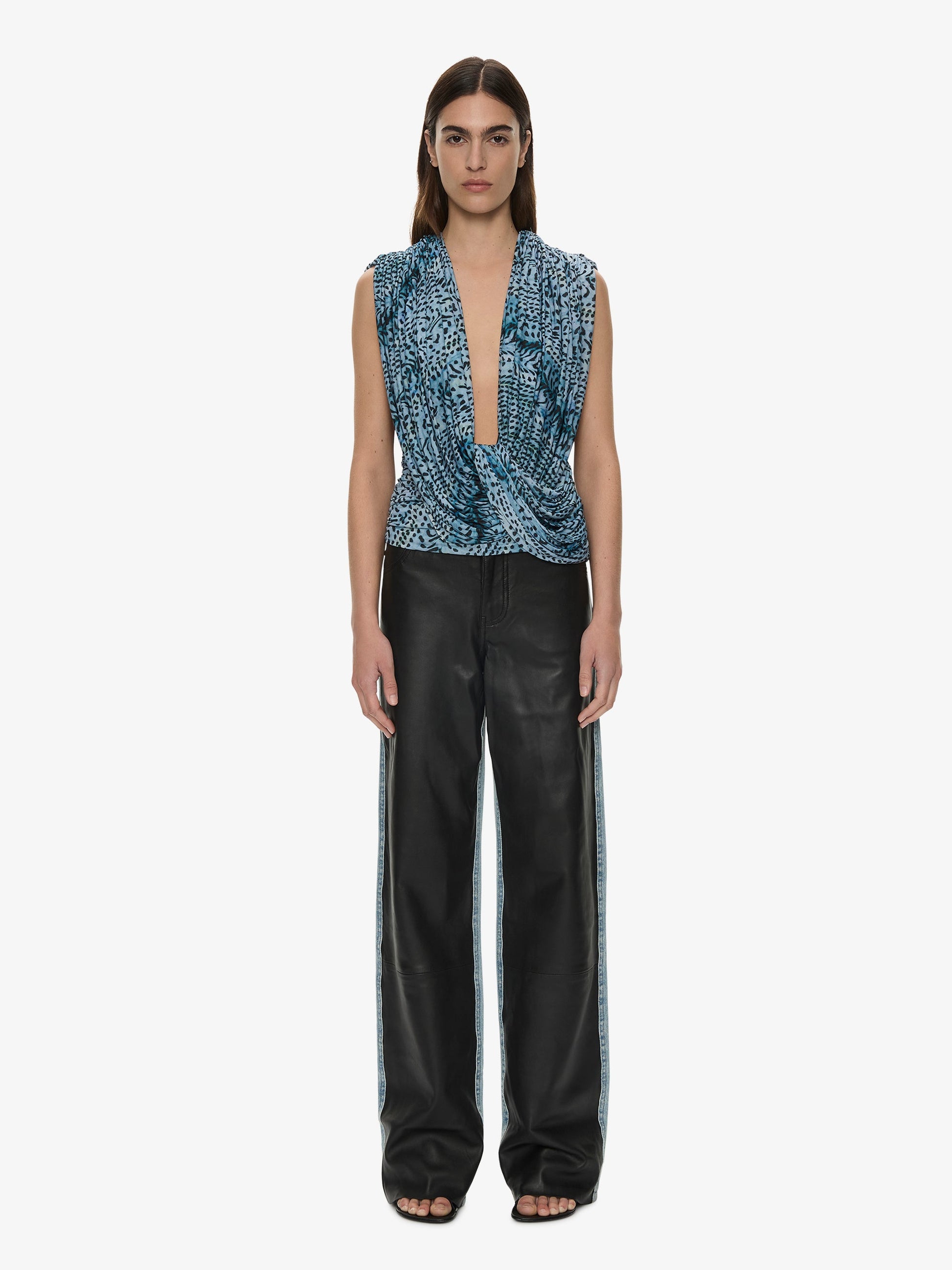 Image of a model wearing Tops. Product name - Ripple Drape Top in Petrol colour by brand - CHRISTOPHER ESBER