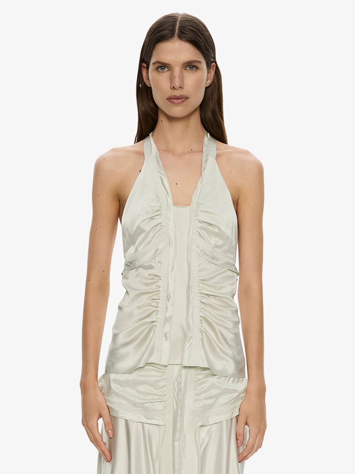 Image of a model wearing Tops. Product name - Invert Silk Gwen Cami in Mint colour by brand - CHRISTOPHER ESBER