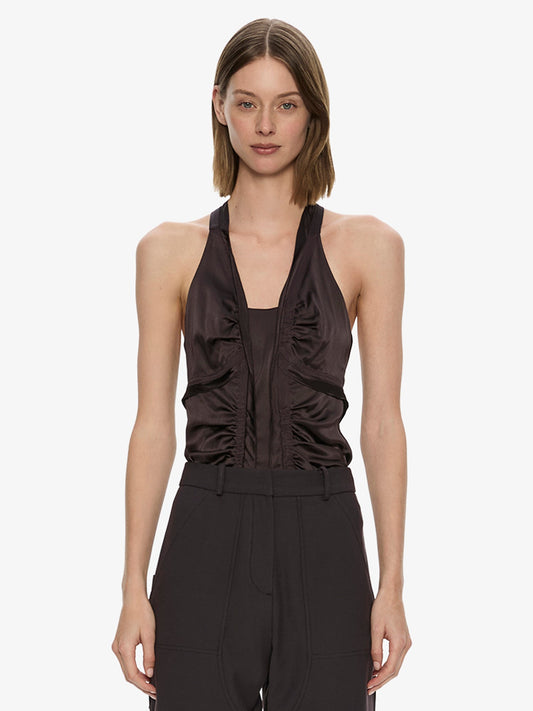 Image of a model wearing Tops. Product name - Invert Silk Gwen Cami in Molasses colour by brand - CHRISTOPHER ESBER