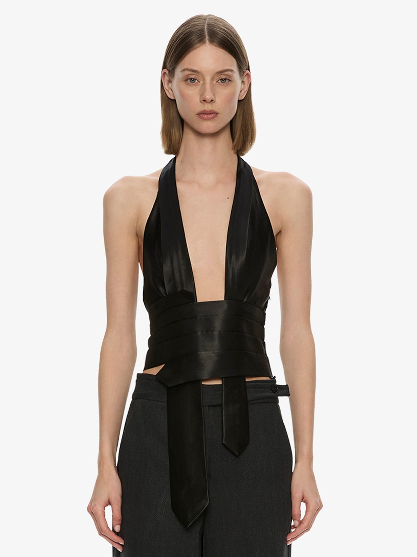 Image of a model wearing Tops. Product name - Reyer Satin Tie Top in Black colour by brand - CHRISTOPHER ESBER