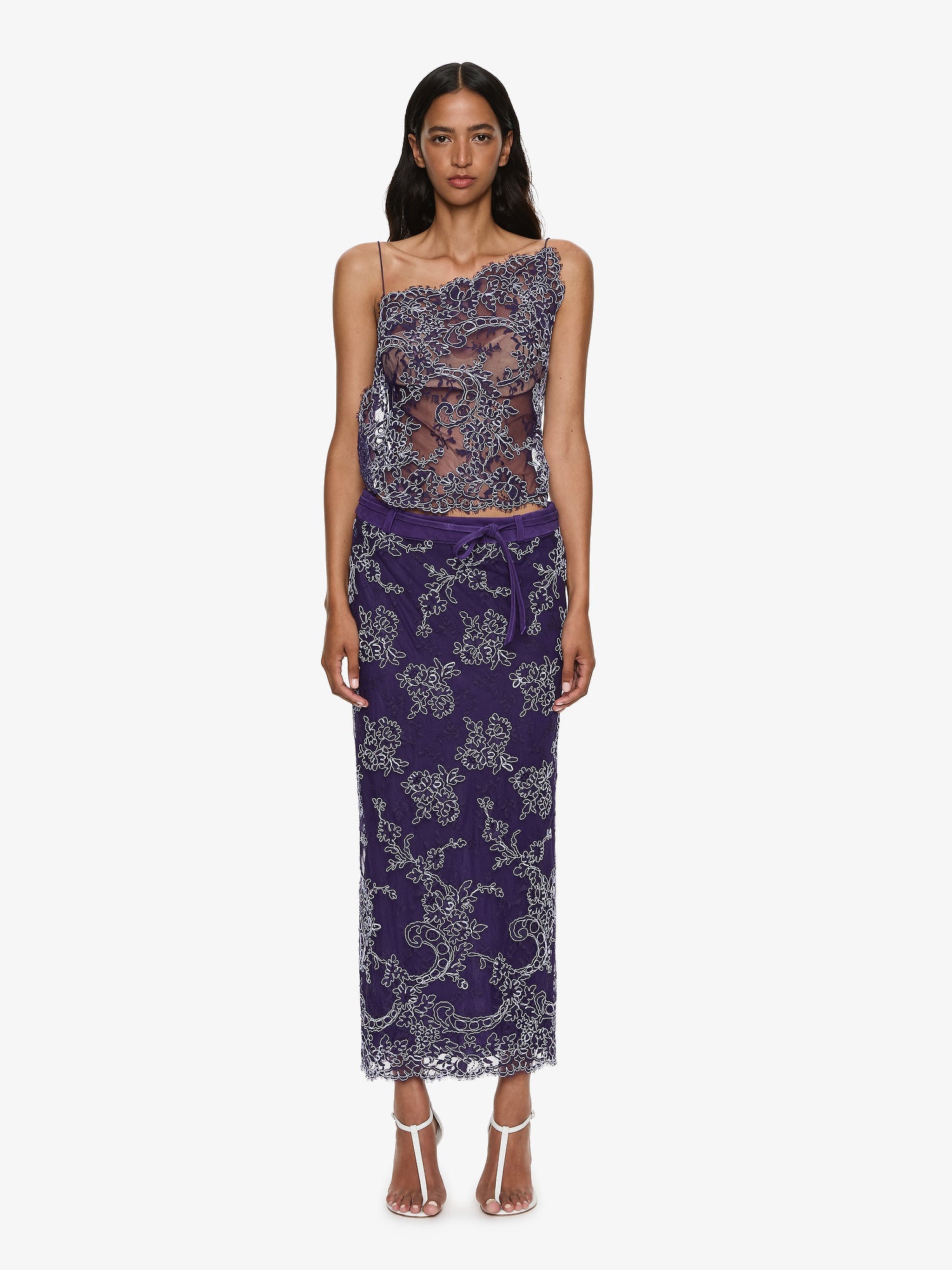 Image of a model wearing Skirts. Productname: CHRISTOPHER ESBER Iris Lace Suede Belted Skirt in Viola colour by brand - CHRISTOPHER ESBER