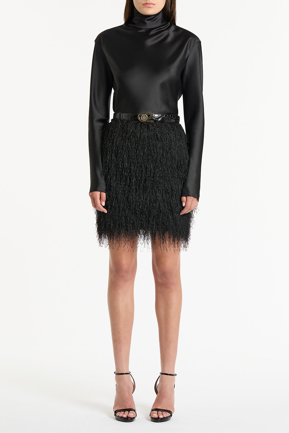 Image of a model wearing Tops. Product name - Black Satin Long Sleeve Top in Black colour by brand - Carla Zampatti
