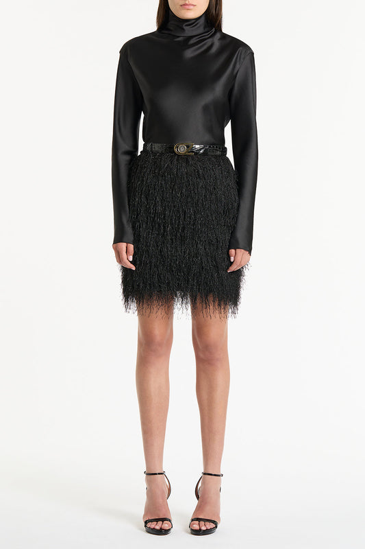 Image of a model wearing Tops. Product name - Black Satin Long Sleeve Top in Black colour by brand - Carla Zampatti