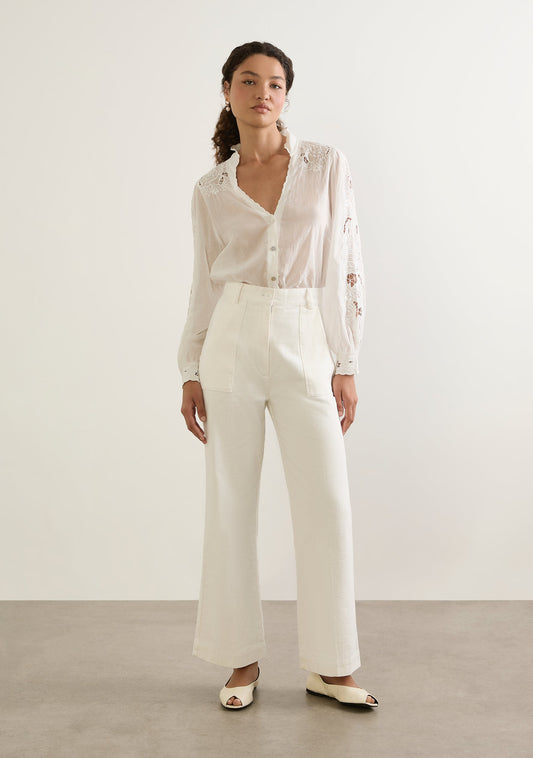 Image of a model wearing Pants. Productname: Auguste The Label James Bootleg Pant in White colour by brand - Auguste The Label