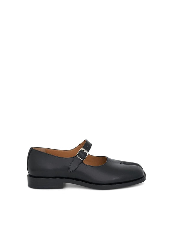 Image of Flats. Product name - Tabi Mary Janes with Strap in Black colour by brand - MAISON MARGIELA