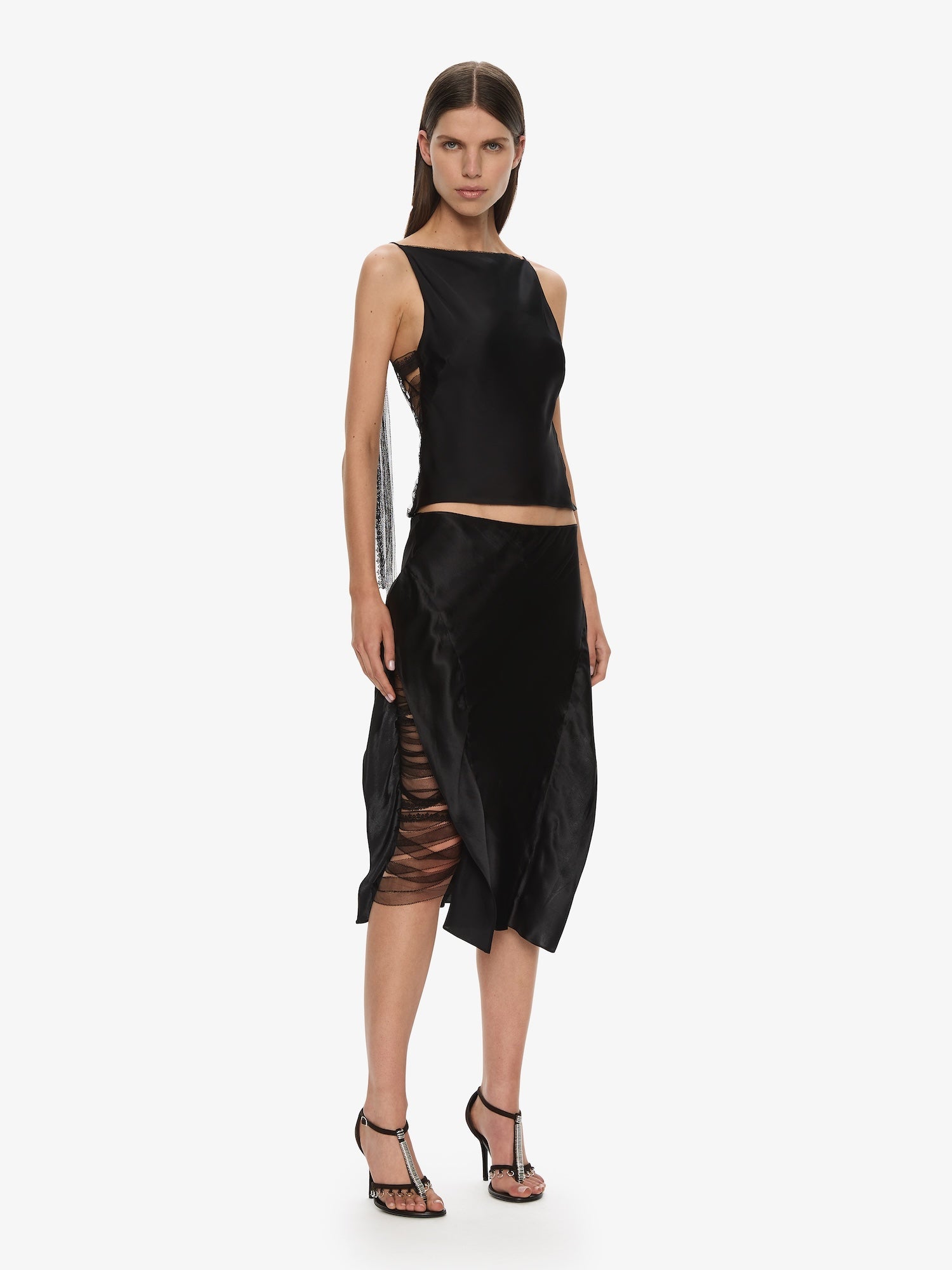 Image of a model wearing Skirts. Productname: CHRISTOPHER ESBER Lattice Lace Silk Skirt in Black colour by brand - CHRISTOPHER ESBER