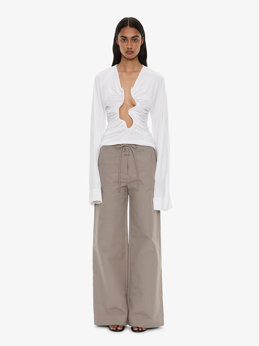Image of a model wearing Pants. Product name - Hudson Boardie Trouser in Slate colour by brand - CHRISTOPHER ESBER