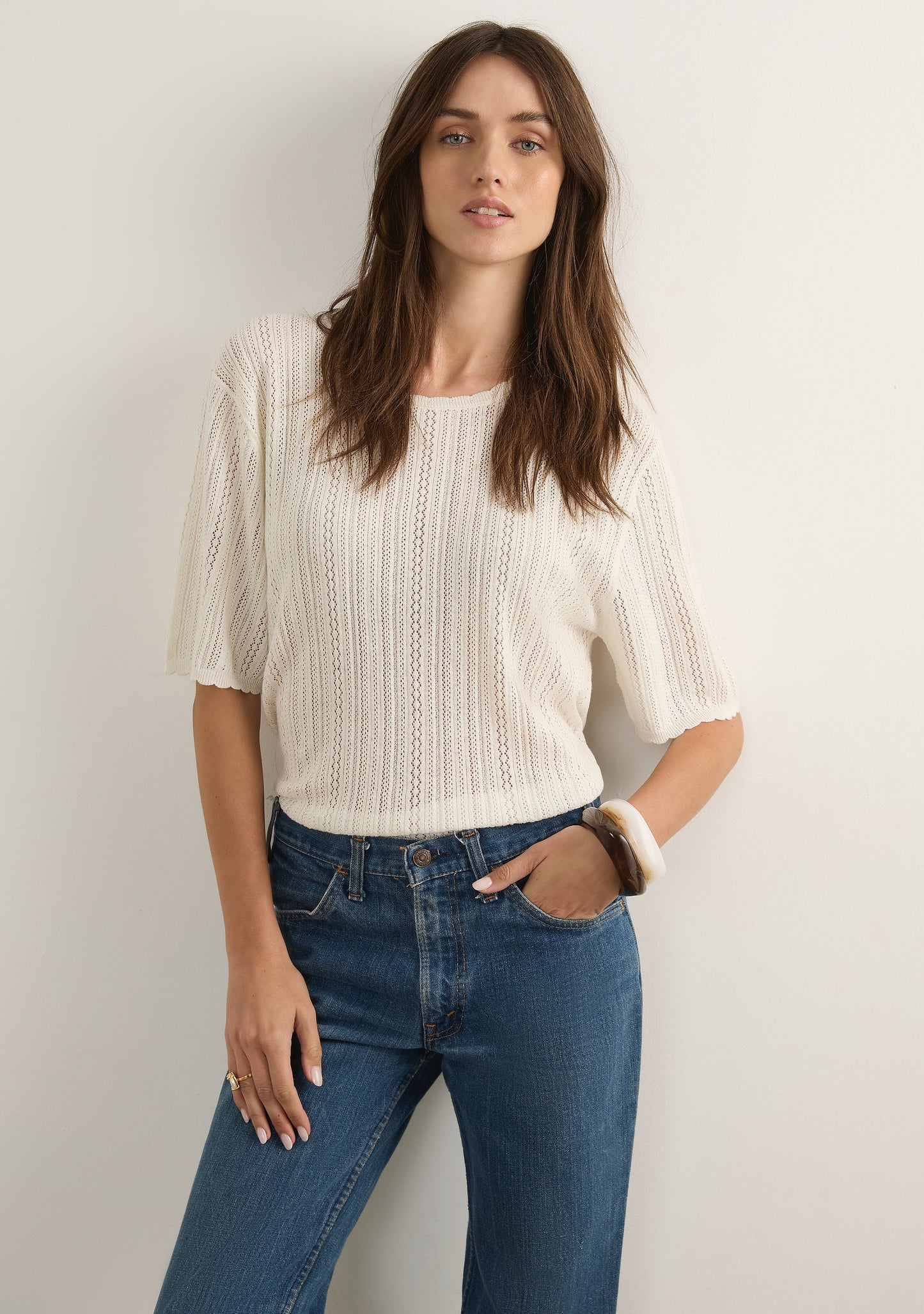Image of a model wearing Outerwear. Productname: Auguste The Label Callen Knit Tee in Print colour by brand - Auguste The Label