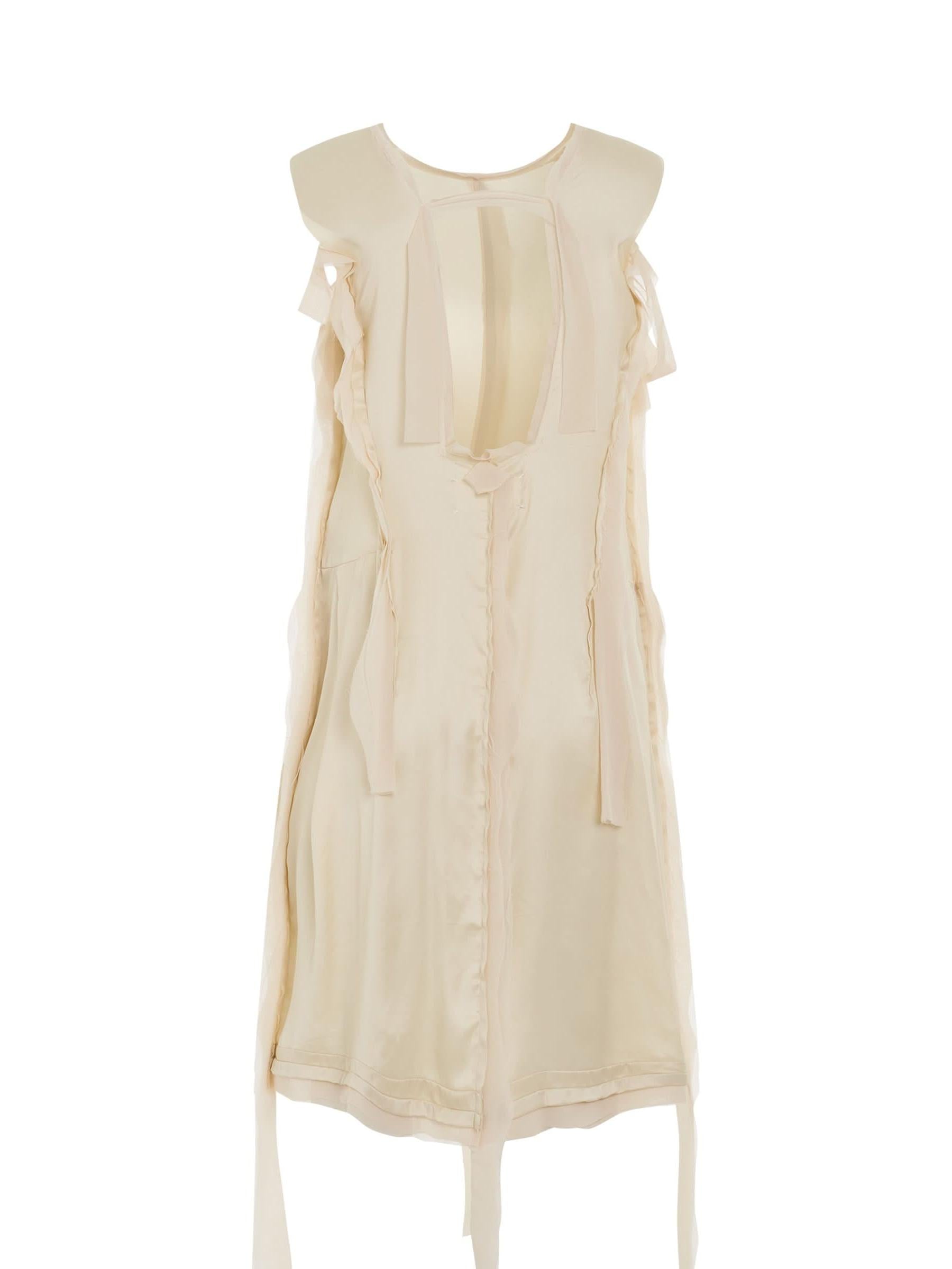 Image of a model wearing Dress. Productname: MAISON MARGIELA Asymmetric Distressed Dress in Butter colour by brand - MAISON MARGIELA