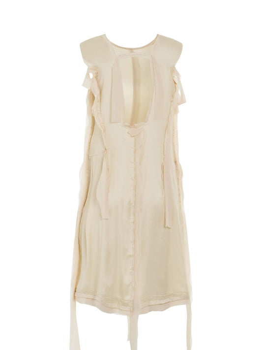 Image of a model wearing Dress. Productname: MAISON MARGIELA Asymmetric Distressed Dress in Butter colour by brand - MAISON MARGIELA
