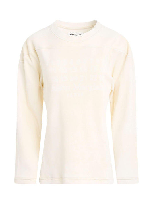Image of a model wearing Outerwear. Productname: MAISON MARGIELA Rib Cotton Logo Sweatshirt in Off White colour by brand - MAISON MARGIELA