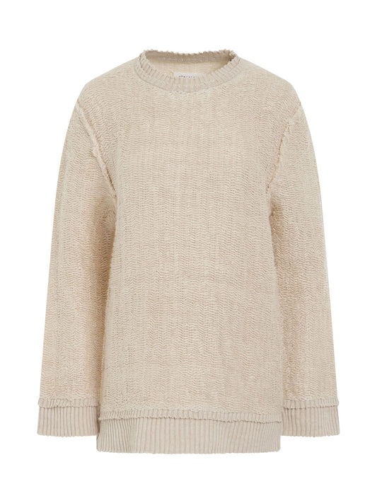 Image of a model wearing Outerwear. Productname: MAISON MARGIELA Raw Woven Oversize Knit Sweater in Beige colour by brand - MAISON MARGIELA