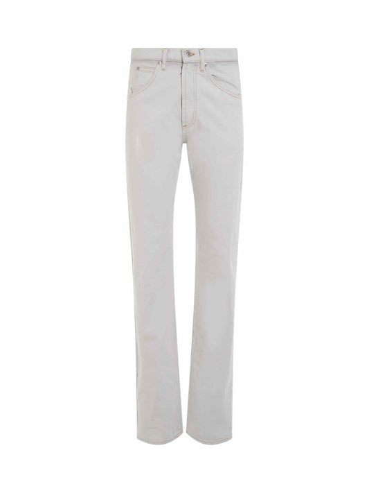 Image of a model wearing Denim. Productname: MAISON MARGIELA Memory of Jeans in Ice colour by brand - MAISON MARGIELA