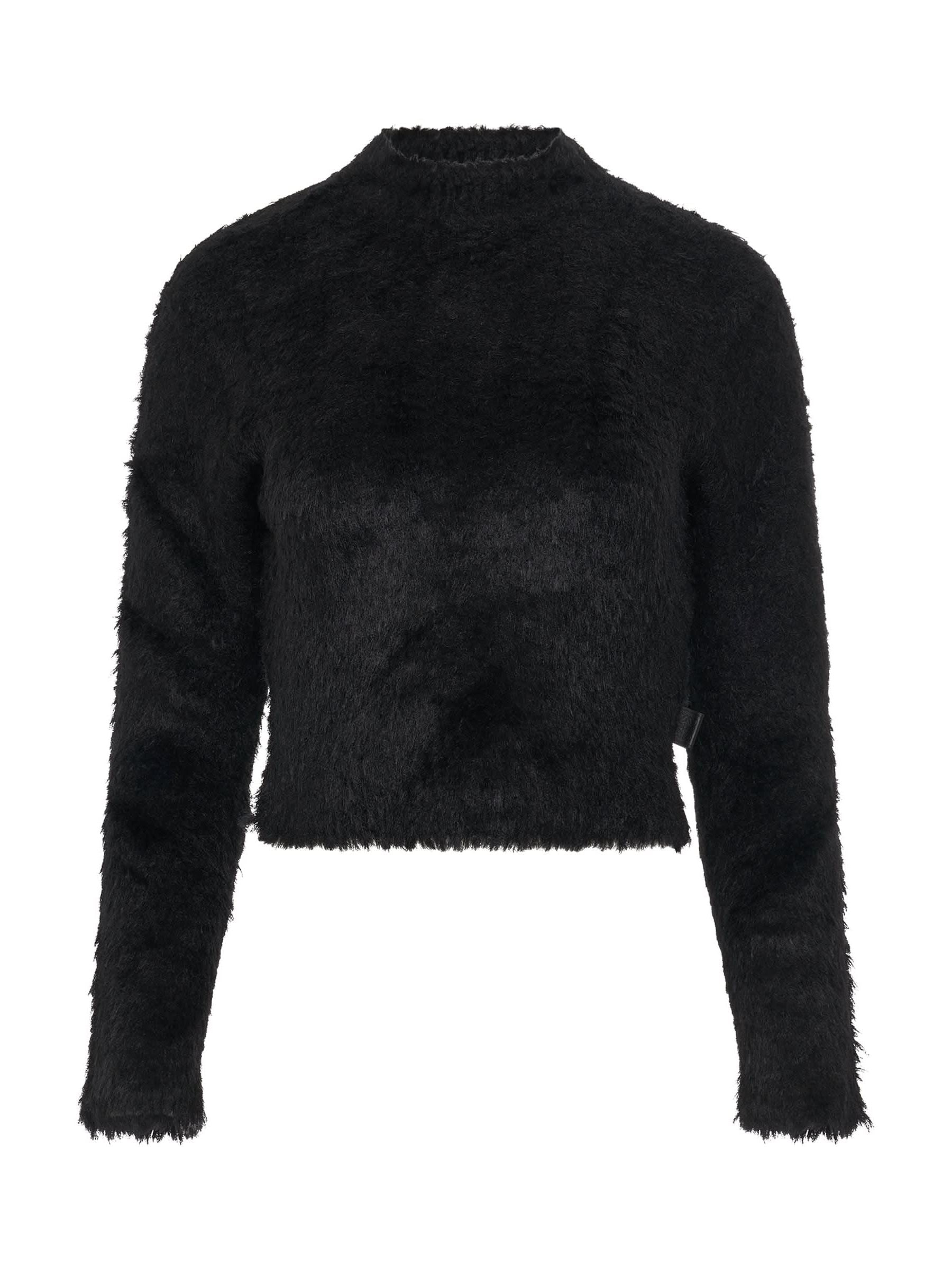 Image of a model wearing Outerwear. Productname: LOEWE Fluffy Sweater in Black colour by brand - LOEWE