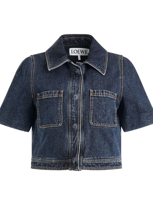Image of a model wearing Denim. Productname: LOEWE Reproportioned Denim Jacket in Raw Denim colour by brand - LOEWE
