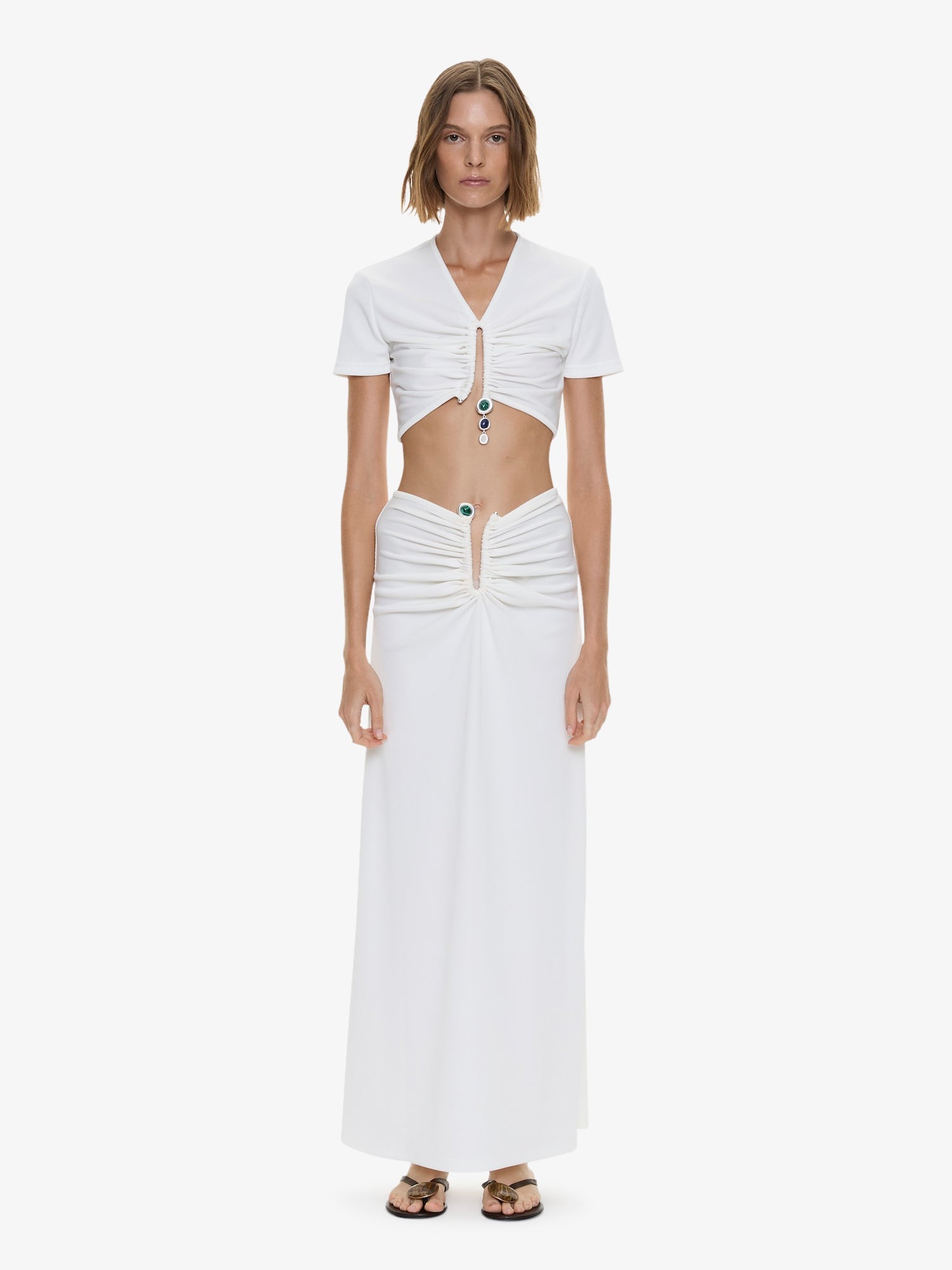 Image of a model wearing Skirts. Product name - Droplet Crystal Clasp Skirt in White colour by brand - CHRISTOPHER ESBER