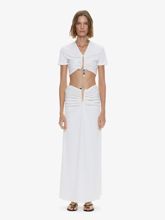 Image of a model wearing Tops. Product name - Droplet Crystal Pendant Ruched Tee in White colour by brand - CHRISTOPHER ESBER
