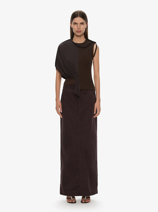 Image of a model wearing Skirts. Product name - Corduroy Tailored Column Skirt in Malbec colour by brand - CHRISTOPHER ESBER
