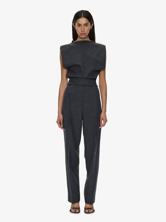 Image of a model wearing Pants. Product name - Banyan Tailored Trouser in Marle colour by brand - CHRISTOPHER ESBER
