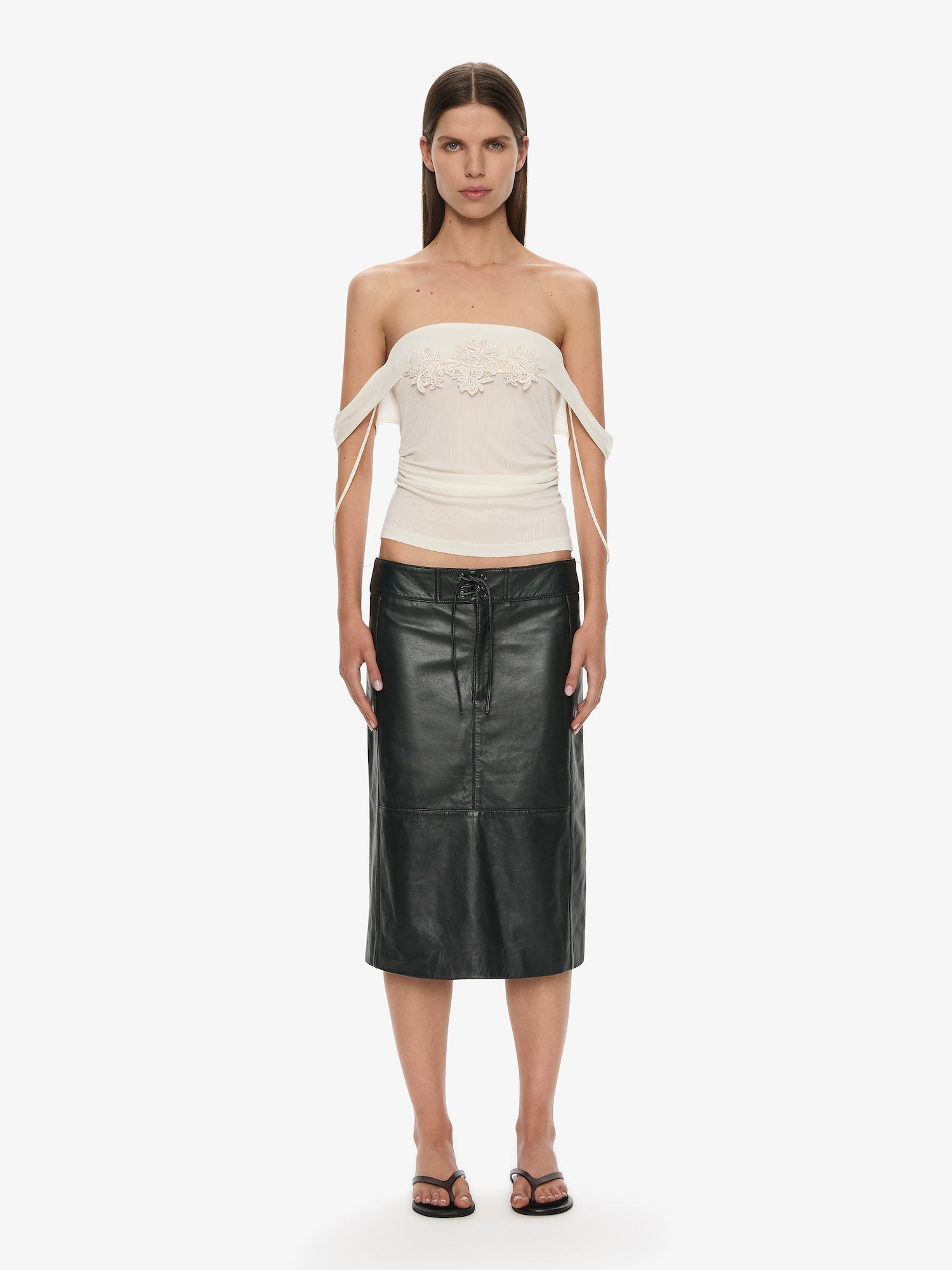 Image of a model wearing Skirts. Productname: Christopher Esber Eddie Leather Skirt in Skirt colour by brand - Christopher Esber
