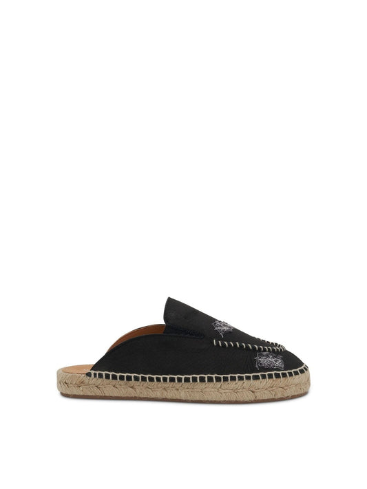 Image of Flats. Productname: MAISON MARGIELA Embroidered Espadrille Mules in Black colour by brand - MAISON MARGIELA
