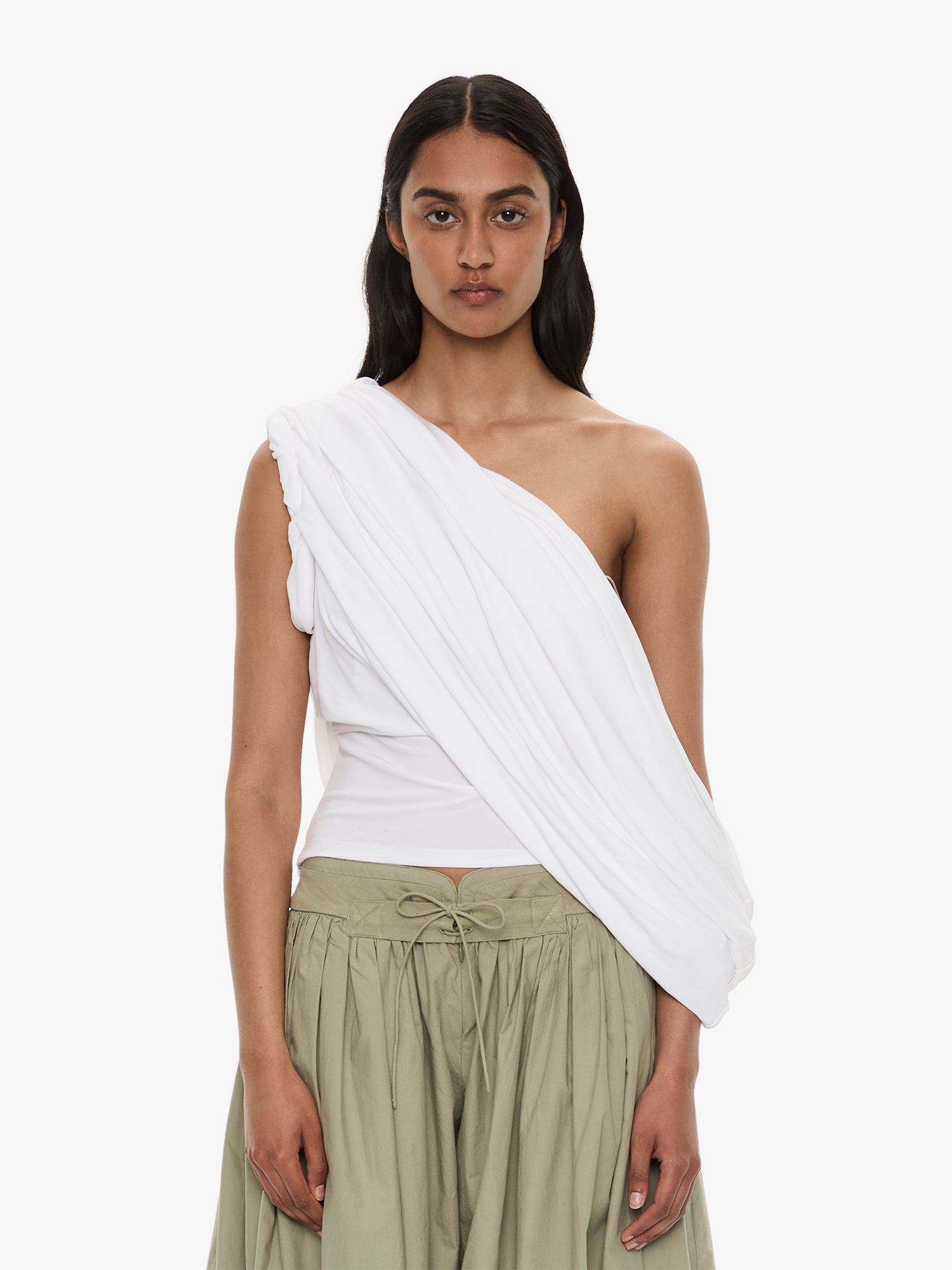 Image of a model wearing Tops. Product name - Aiba Draped Jersey Tee in White colour by brand - CHRISTOPHER ESBER