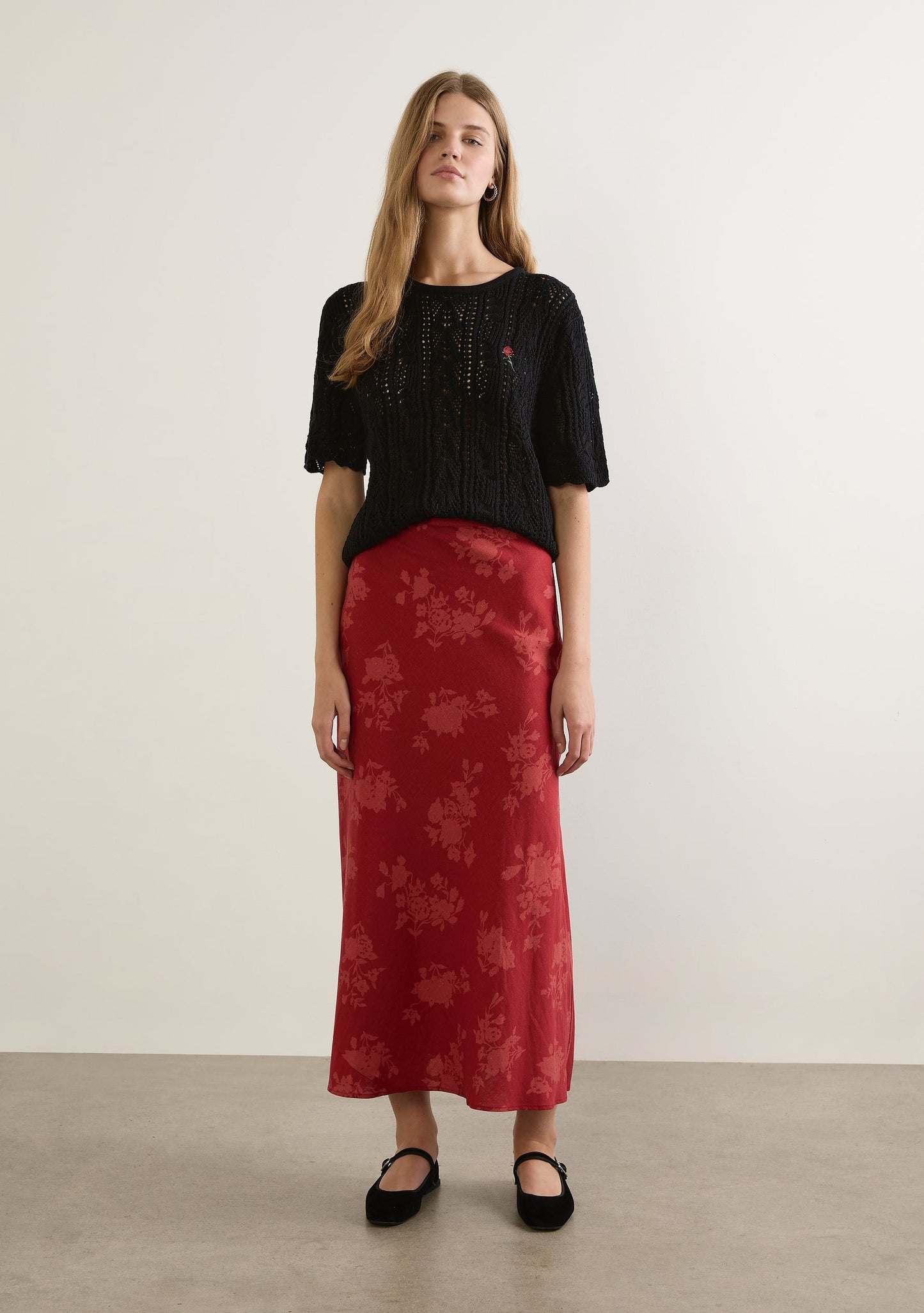 Image of a model wearing Skirts. Productname: Auguste The Label Stefan Maxi Skirt in Red colour by brand - Auguste The Label
