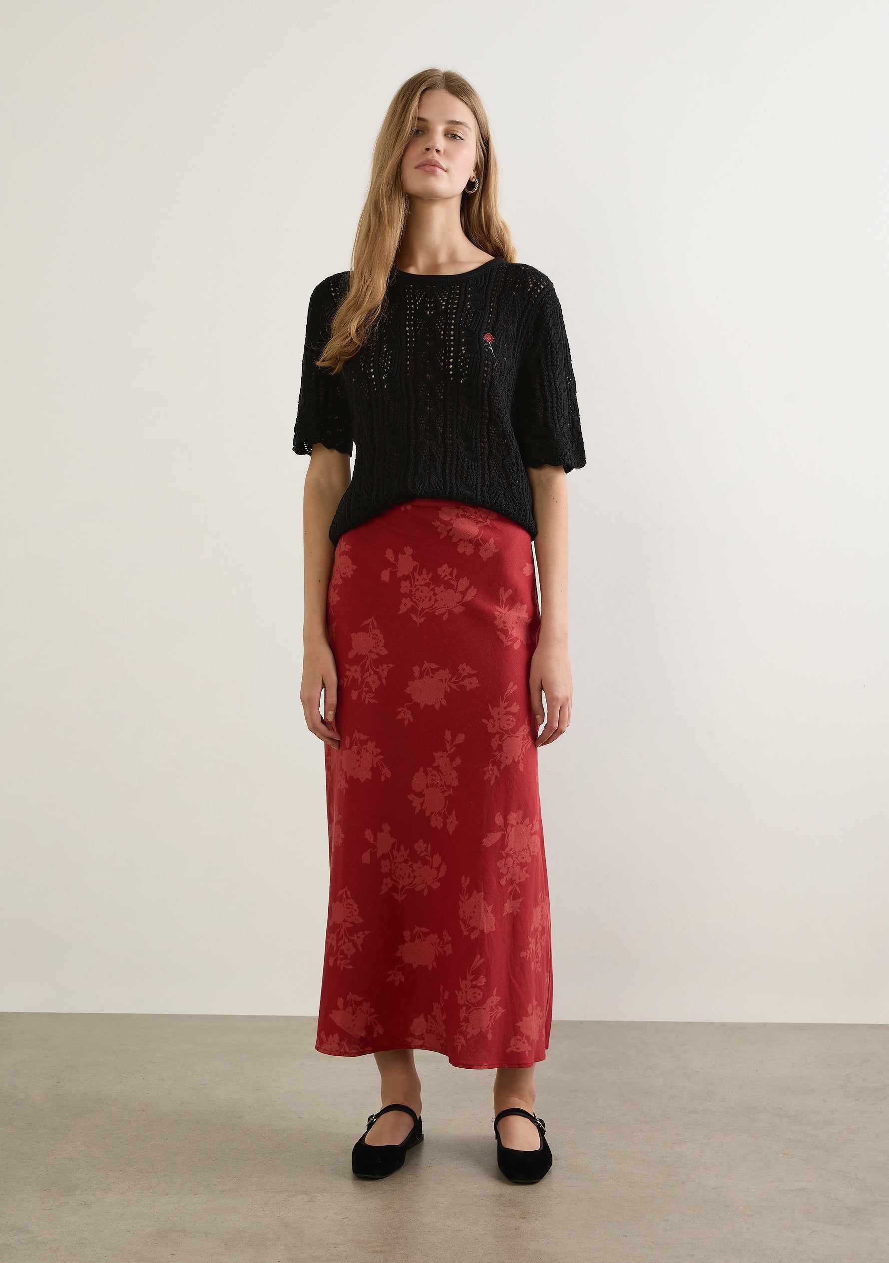 Image of a model wearing Skirts. Productname: Auguste The Label Stefan Maxi Skirt in Red colour by brand - Auguste The Label