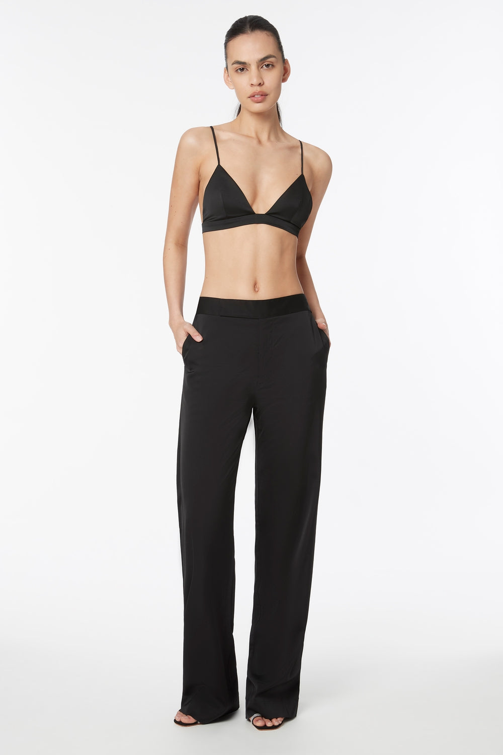 Image of a model wearing Tops. Productname: Face To Face Bralette in Black colour by brand - Manning Cartell