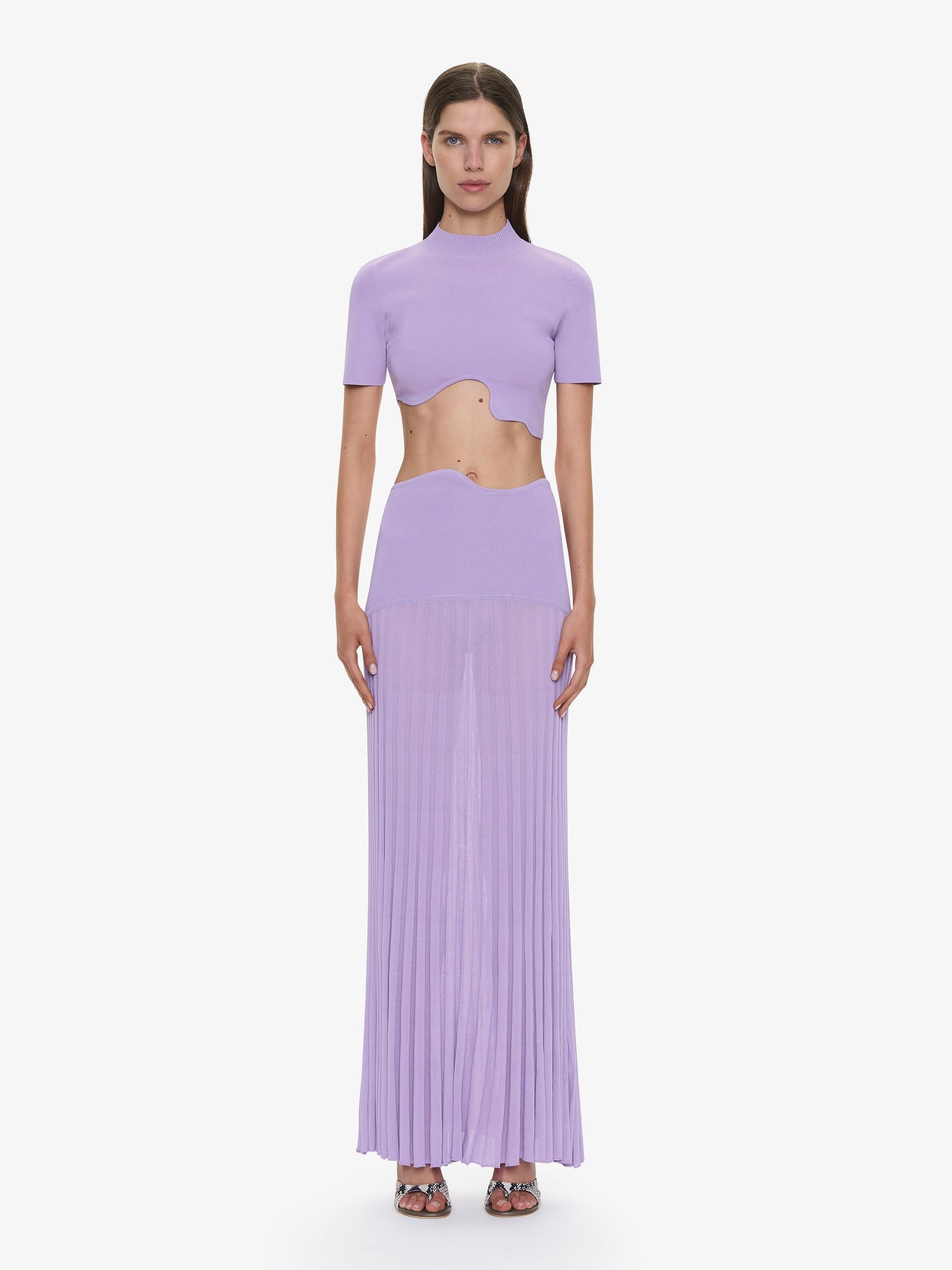 Image of a model wearing Skirts. Productname: CHRISTOPHER ESBER Maparadita Pleated Skirt in Lilac colour by brand - CHRISTOPHER ESBER