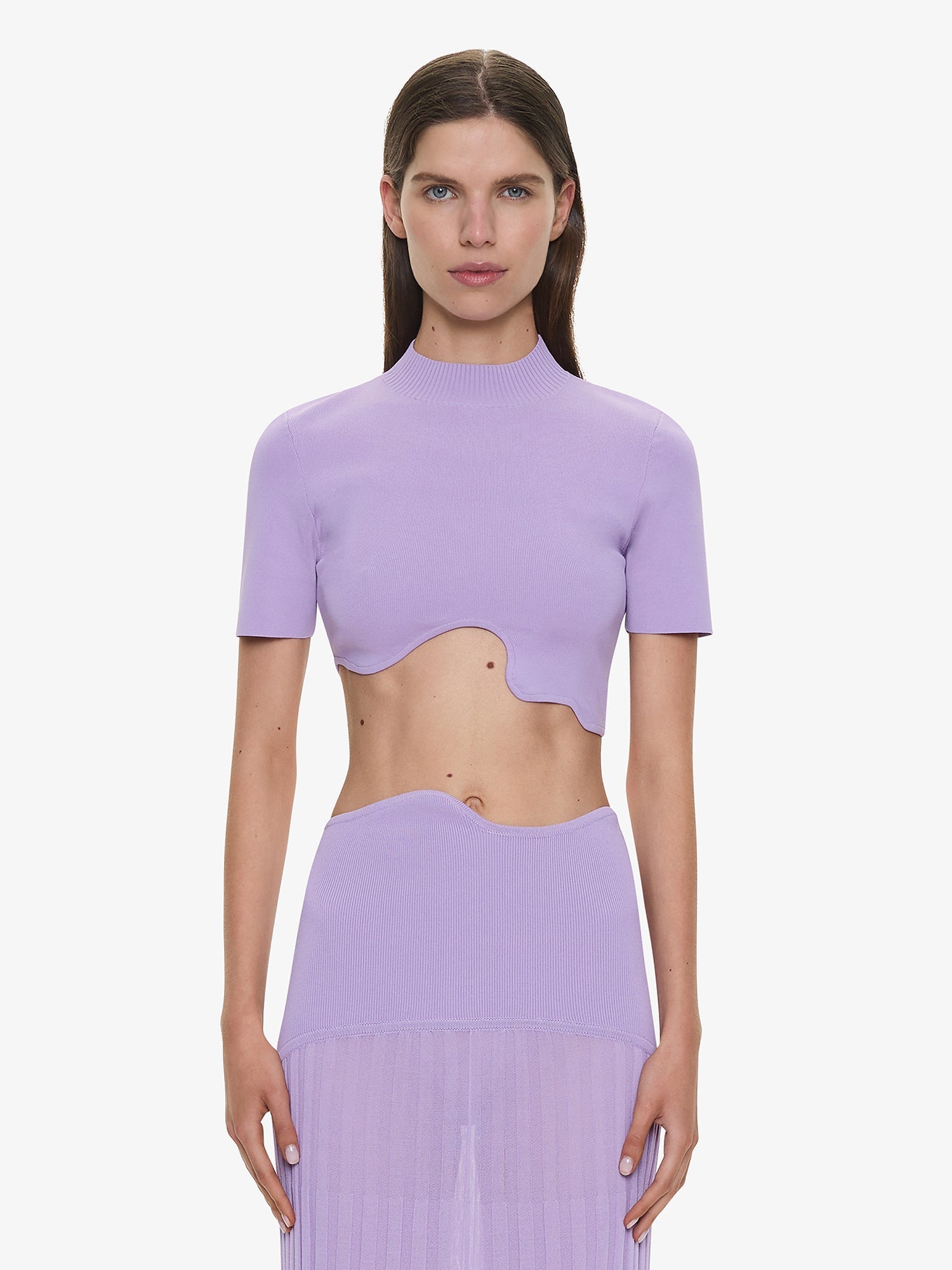 Image of a model wearing Tops. Productname: Maparadita Top in Lilac colour by brand - CHRISTOPHER ESBER