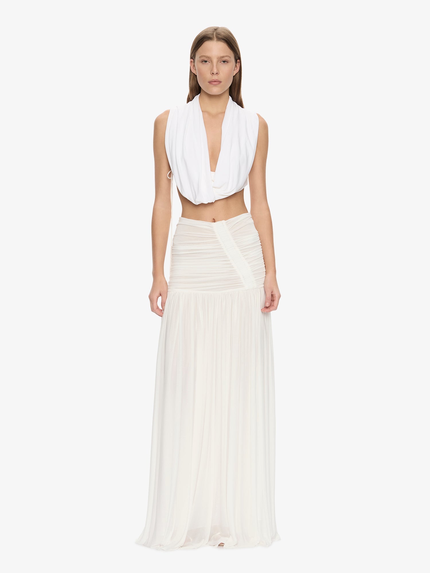 Image of a model wearing Skirts. Product name - Orion Skirt in White colour by brand - CHRISTOPHER ESBER