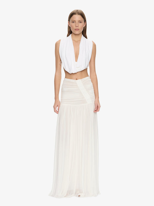 Image of a model wearing Skirts. Product name - Orion Skirt in White colour by brand - CHRISTOPHER ESBER