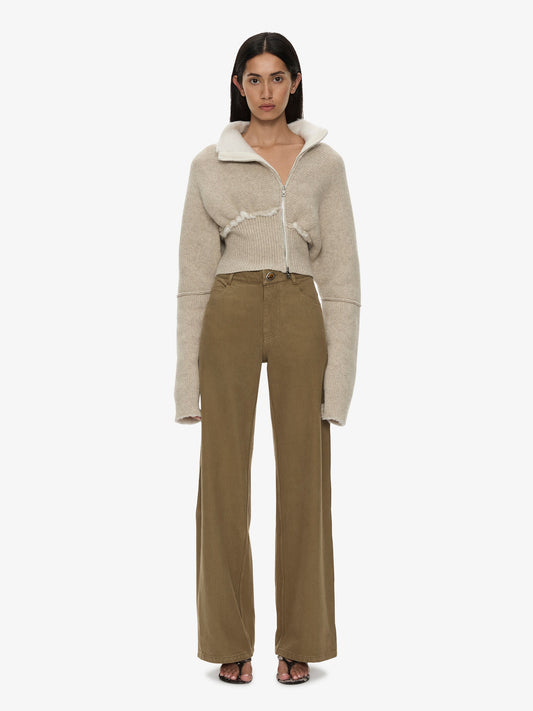 Image of a model wearing Pants. Product name - Relaxed Denim Quartz Jean in Khaki colour by brand - CHRISTOPHER ESBER