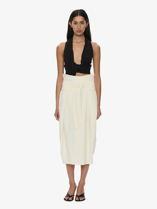 Image of a model wearing Skirts. Product name - Virelle Cocoon Skirt in Cream colour by brand - CHRISTOPHER ESBER