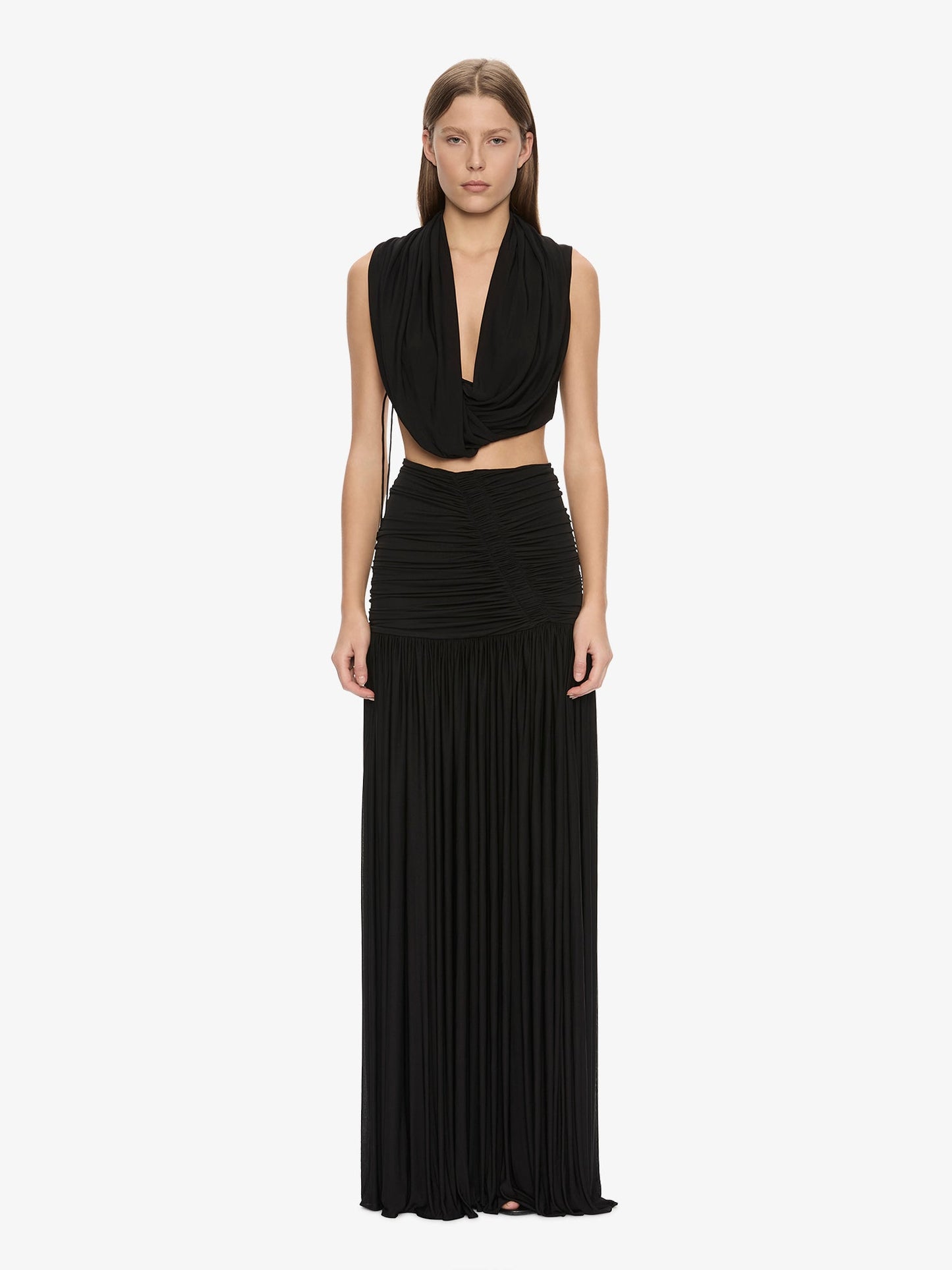 Image of a model wearing Skirts. Product name - Orion Skirt in Black colour by brand - CHRISTOPHER ESBER