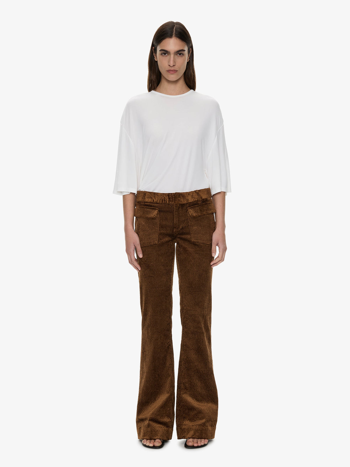 Image of a model wearing Pants. Product name - Enne Pant in Cognac colour by brand - CHRISTOPHER ESBER