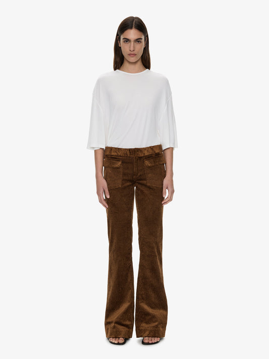 Image of a model wearing Pants. Product name - Enne Pant in Cognac colour by brand - CHRISTOPHER ESBER