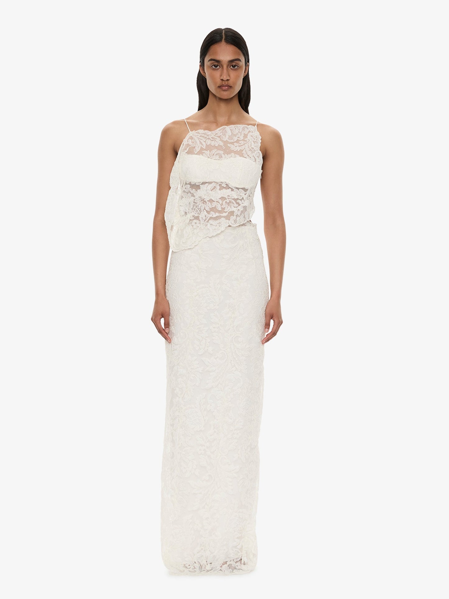 Image of a model wearing Skirts. Product name - Reverie Lace Skirt in White colour by brand - CHRISTOPHER ESBER