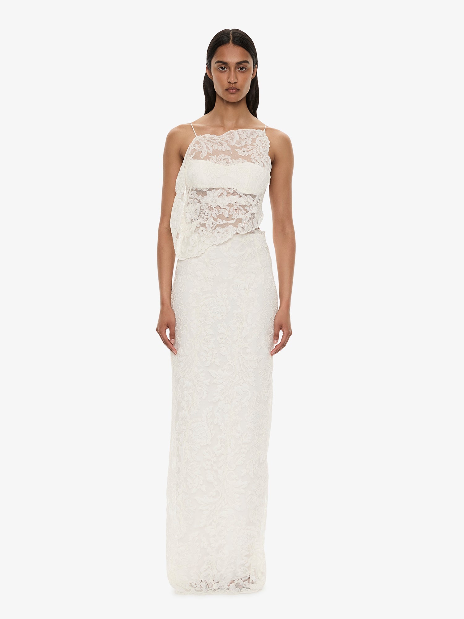 Image of a model wearing Skirts. Product name - Reverie Lace Skirt in White colour by brand - CHRISTOPHER ESBER