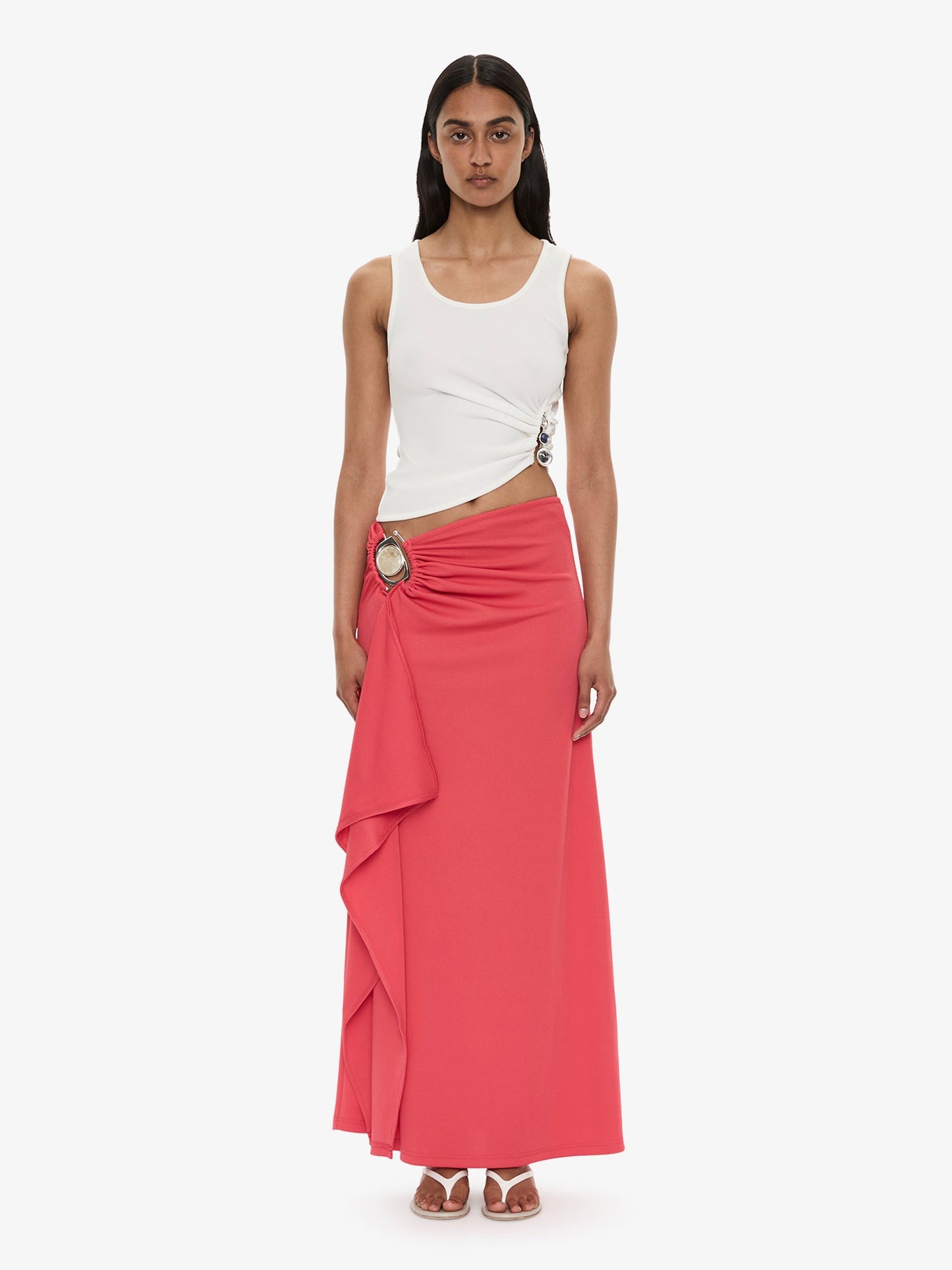 Image of a model wearing Skirts. Product name - Occhio Crystal Cascade Skirt in Watermelon colour by brand - CHRISTOPHER ESBER