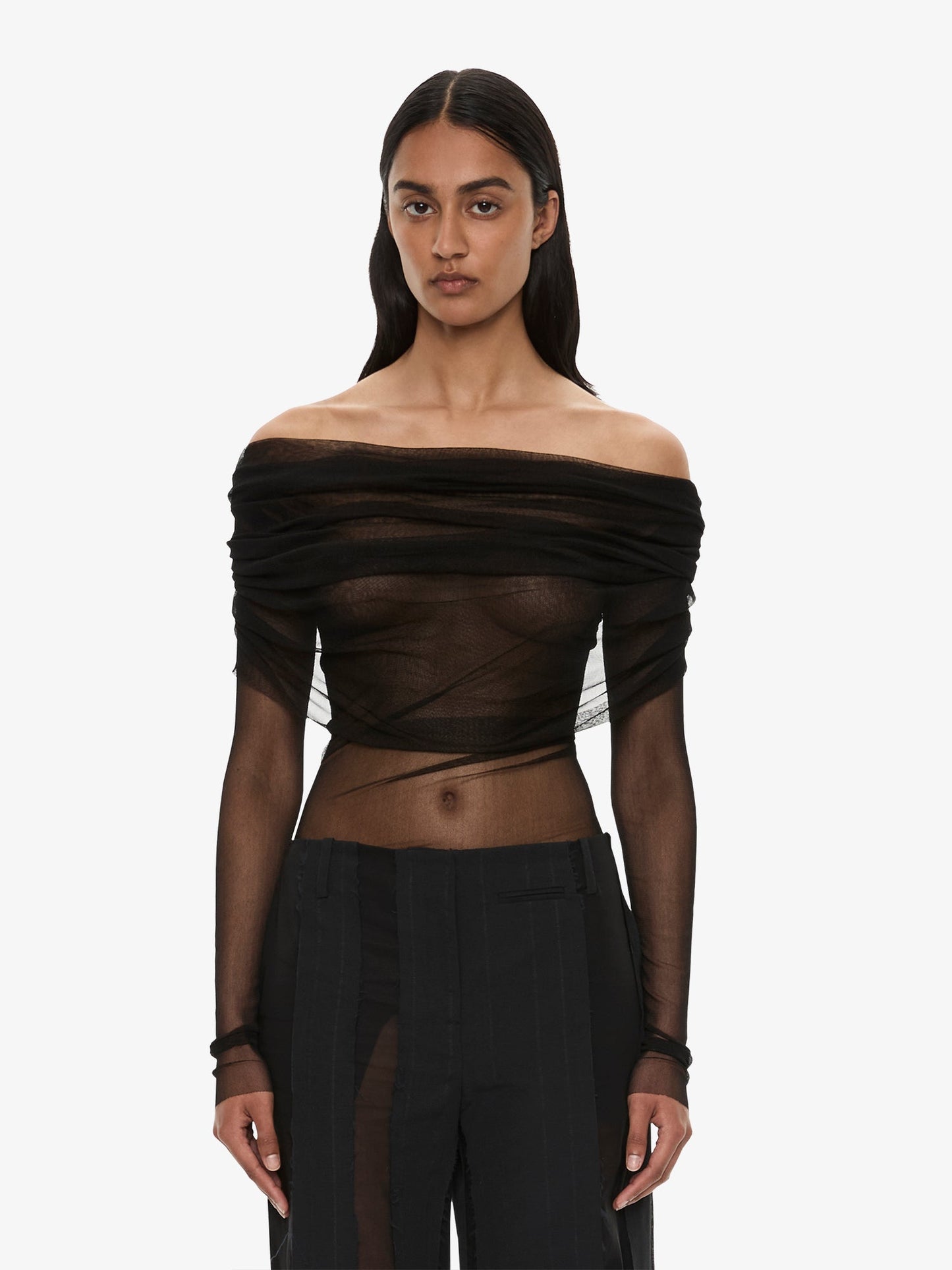 Image of a model wearing Tops. Product name - Veiled Top in Black colour by brand - Christopher Esber