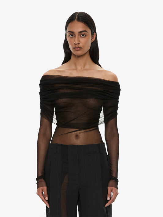 Image of a model wearing Tops. Product name - Veiled Top in Black colour by brand - Christopher Esber