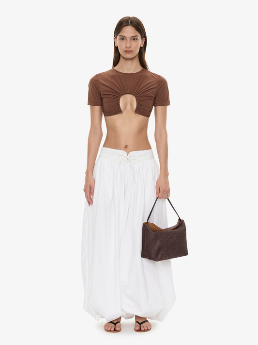 Image of a model wearing Pants. Product name - Drift Tapered Trouser in White colour by brand - CHRISTOPHER ESBER
