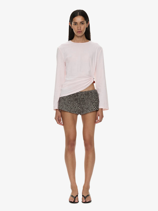 Image of a model wearing Tops. Product name - Bree Quartz Long Sleeve Tee in Pink colour by brand - CHRISTOPHER ESBER