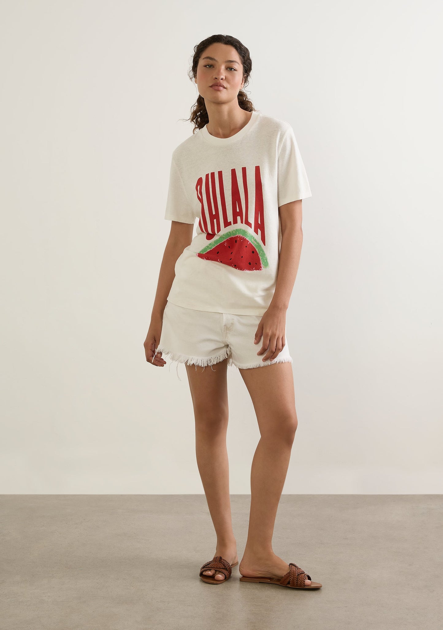 Image of a model wearing Tops. Productname: Auguste The Label Oh La La Classic Tee in White colour by brand - Auguste The Label