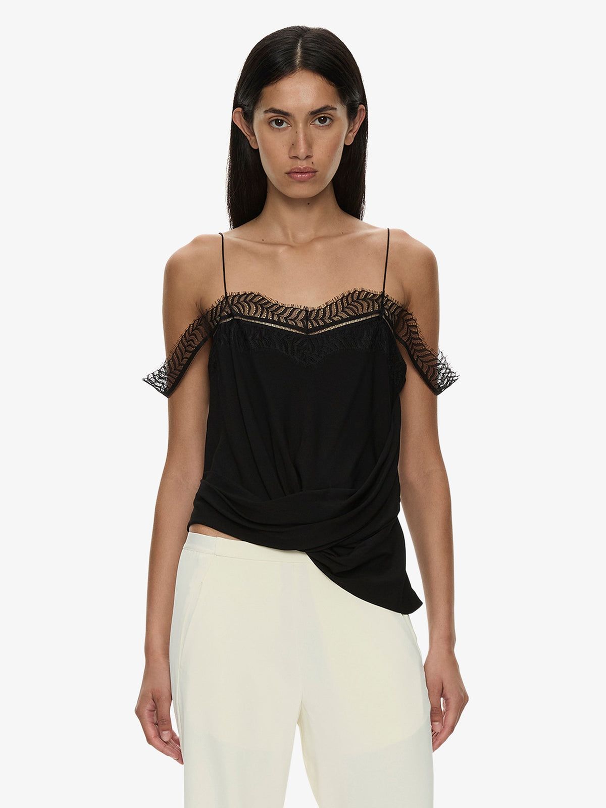 Image of a model wearing Tops. Product name - Miro Split Lace Draped Cami in Black colour by brand - CHRISTOPHER ESBER
